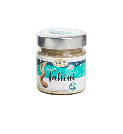 Jar of Alkis Tahini on a white background