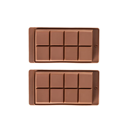 Two chocolate mold trays on a white background